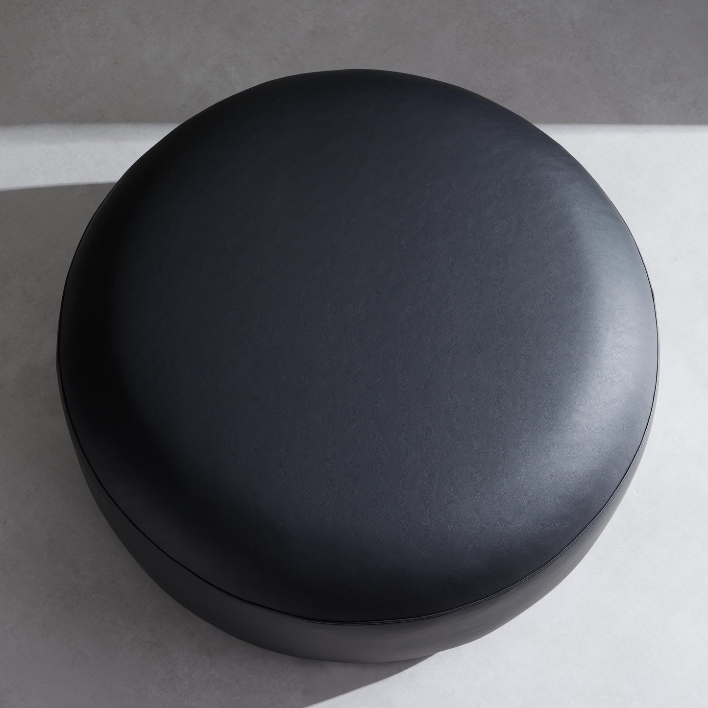 Monolith Round Black Leather Ottoman-Black