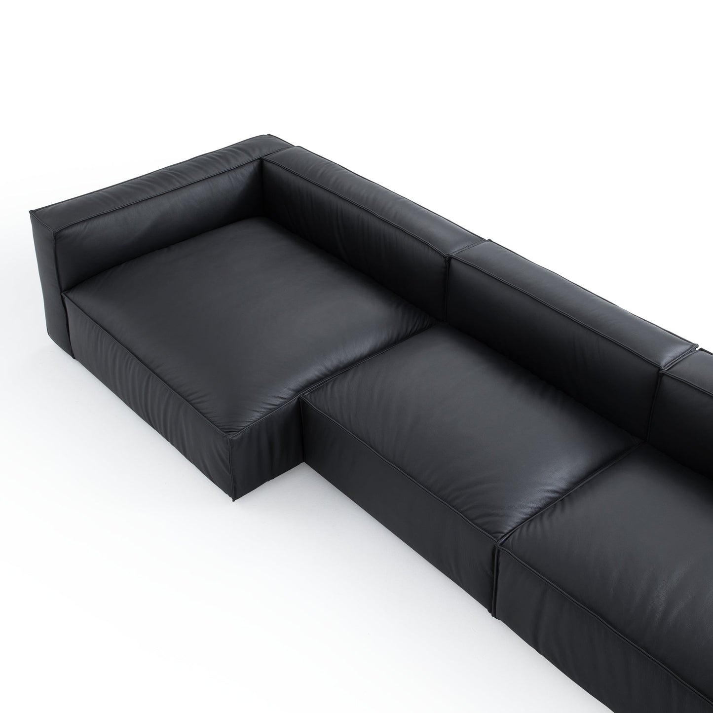 Luxury Minimalist Black Leather Sectional and Ottoman-Black-145.7"-Facing Left
