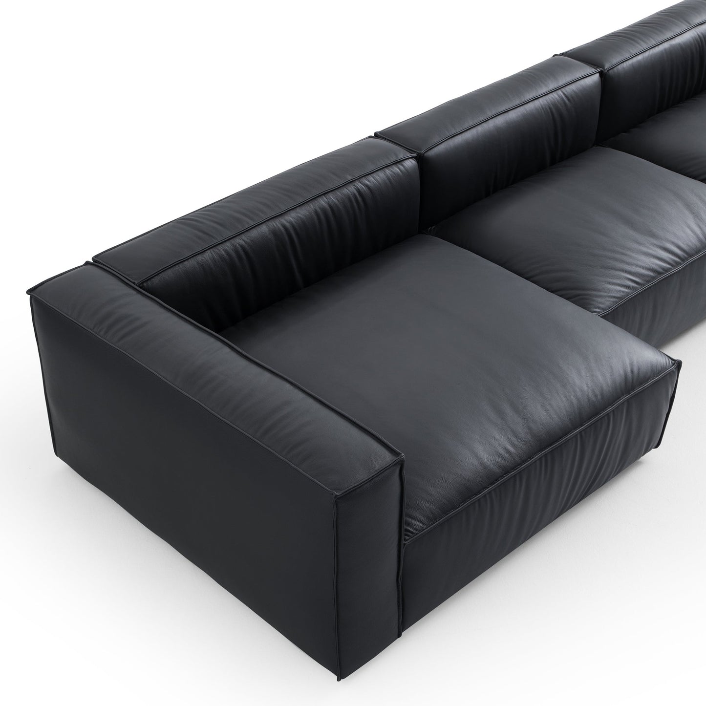 Luxury Minimalist Black Leather Sectional and Ottoman-Black-185.0"-Facing Left