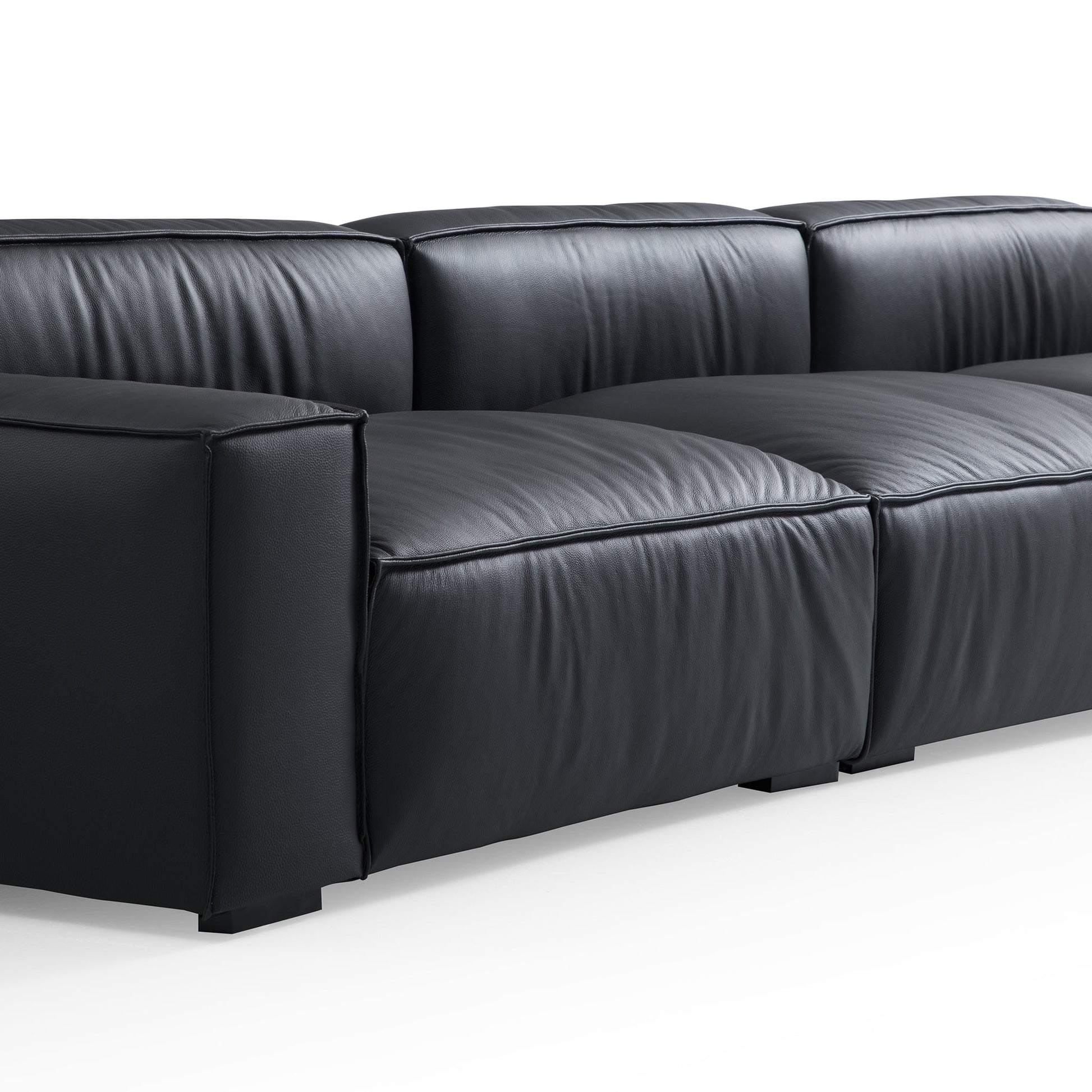 Luxury Minimalist Black Leather Sectional and Ottoman-Black
